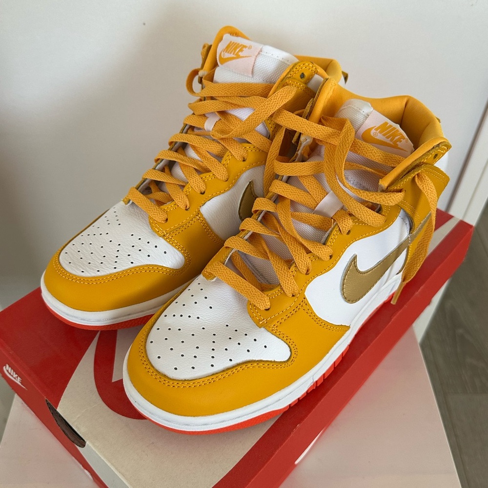 Nike Dunk High in University Gold and Metallic Gold